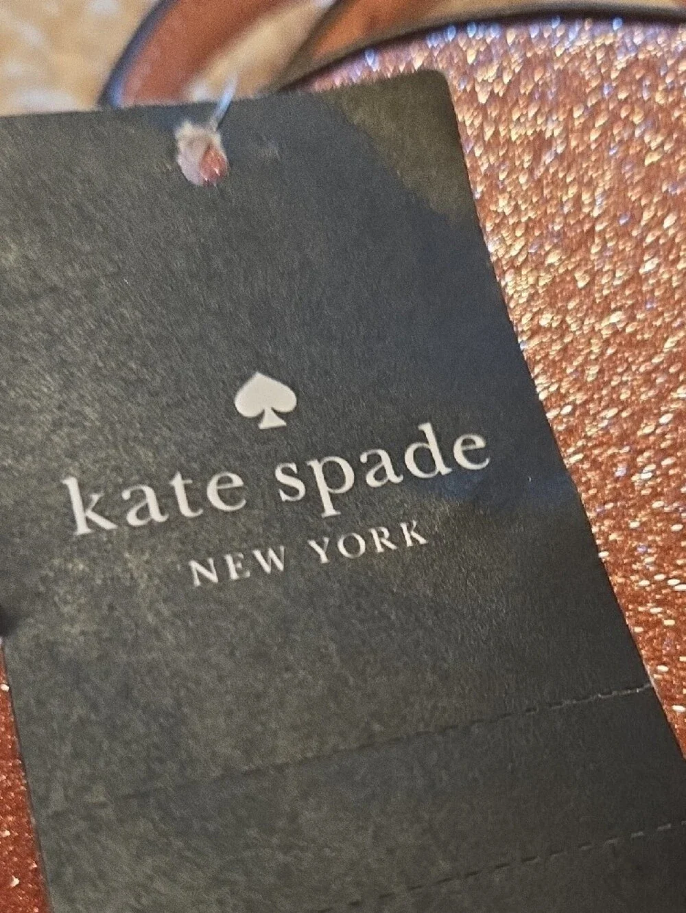 kate spade Rose Gold Glitter Oval Crossbody Bag